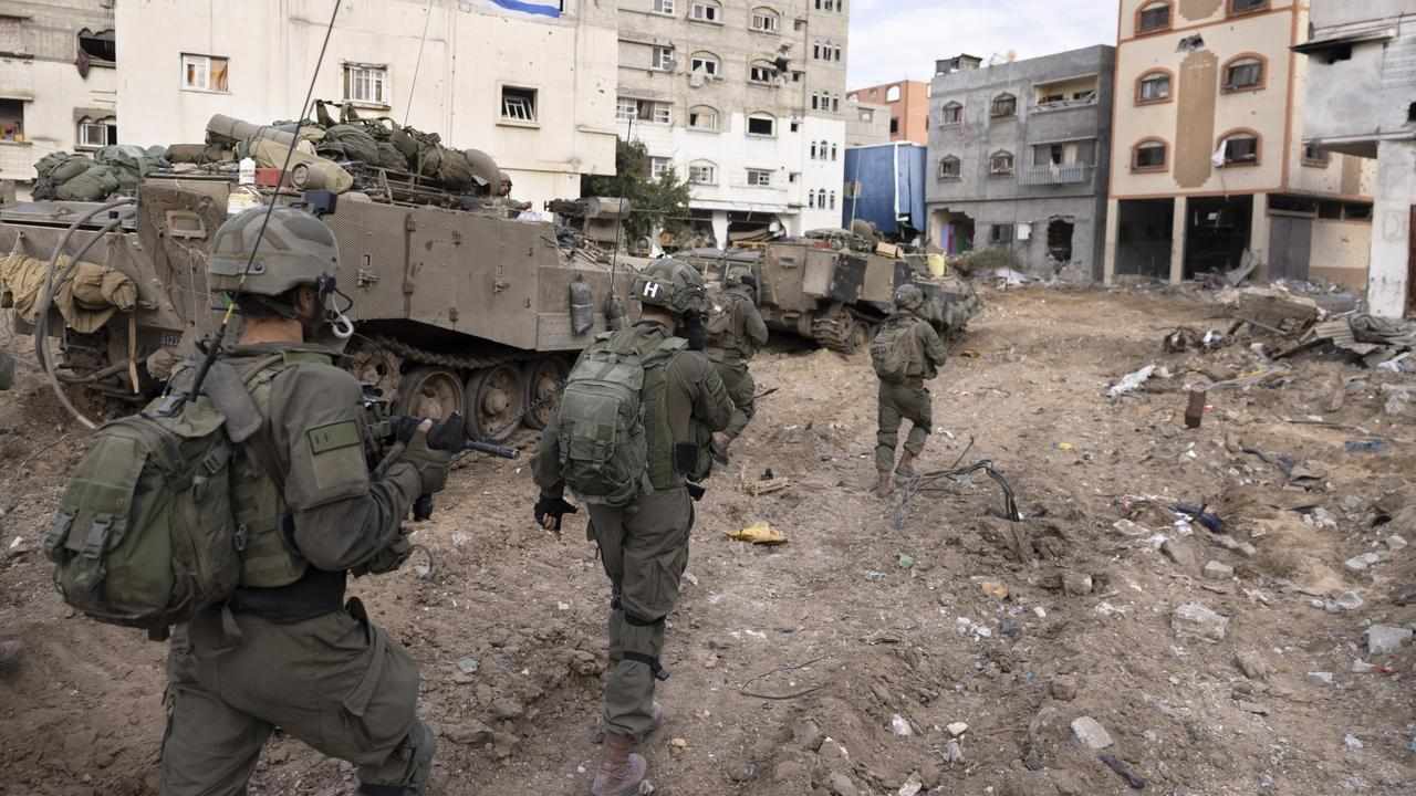 Israeli soldiers in Gaza City's Shijaiyah neighbourhood