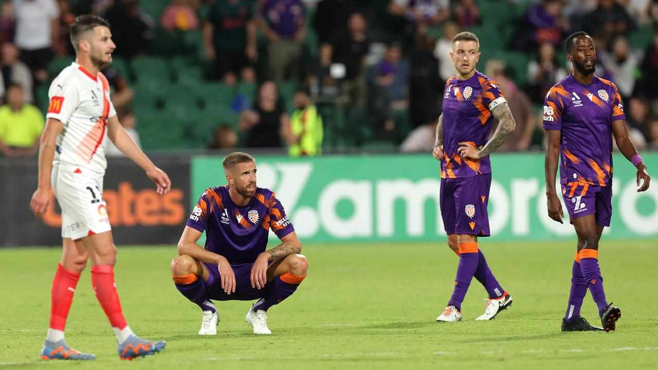 Disappointed Perth Glory players.