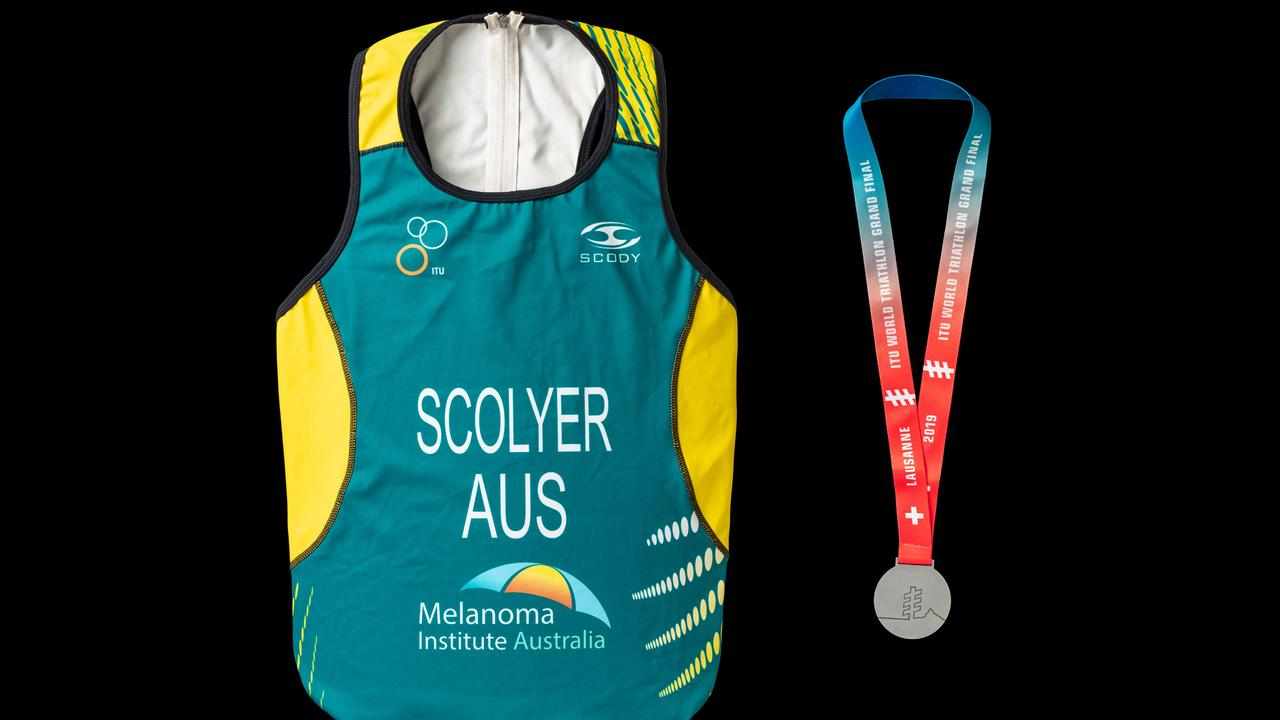 Triathlon suit and medal of Georgina Long and Richard Scolyer