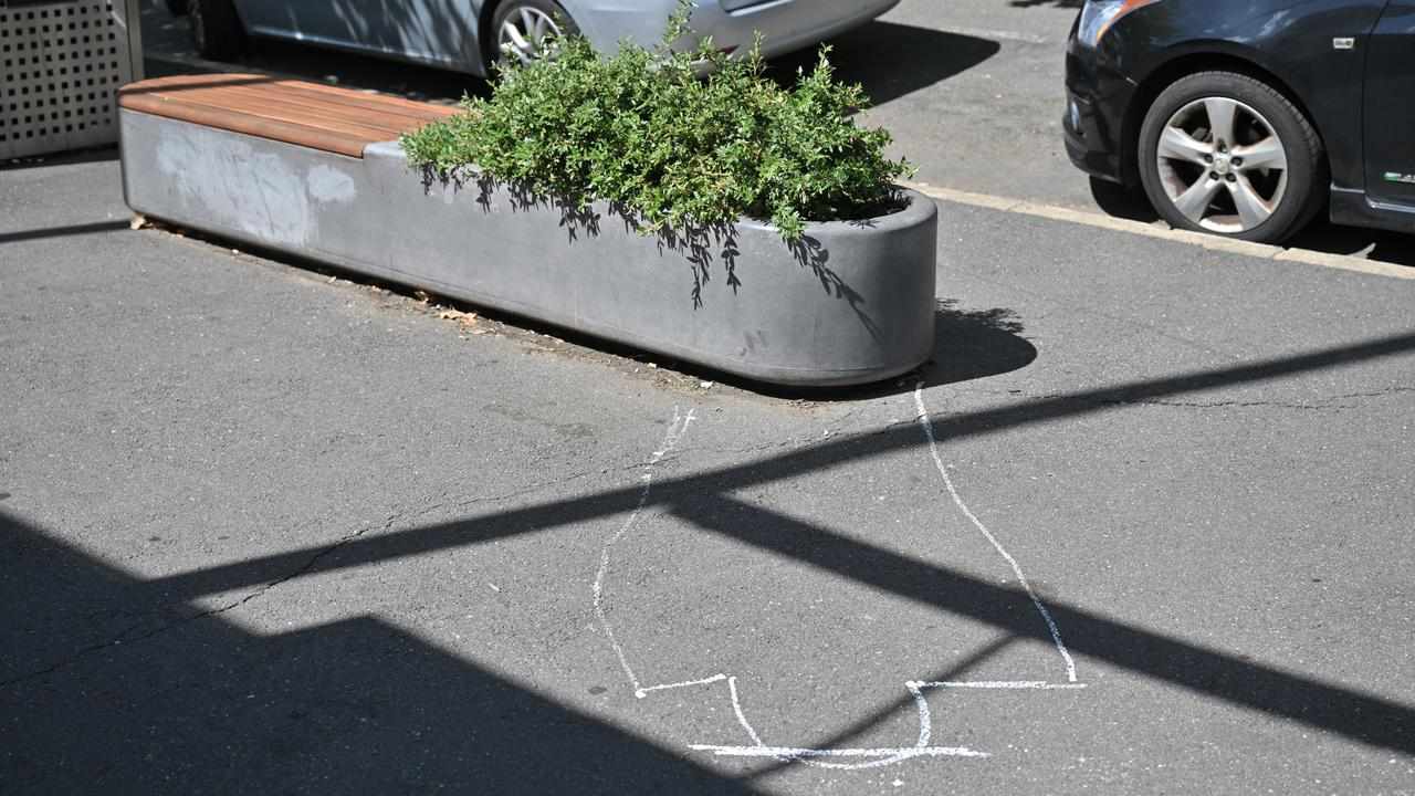 A chalked outline by a planter box where Barnaby Joyce lay down.
