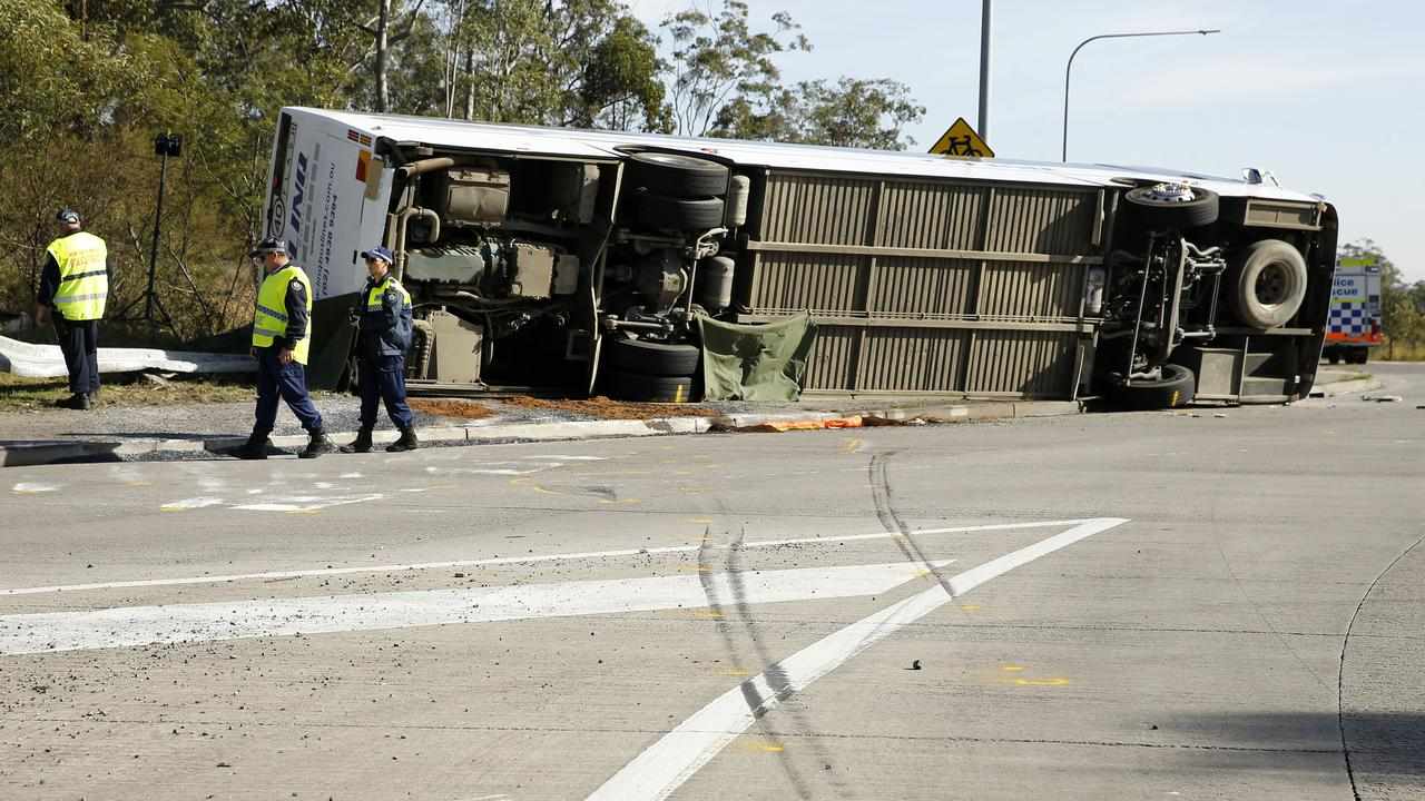 Investigators at the scene of the bus crash (file image)