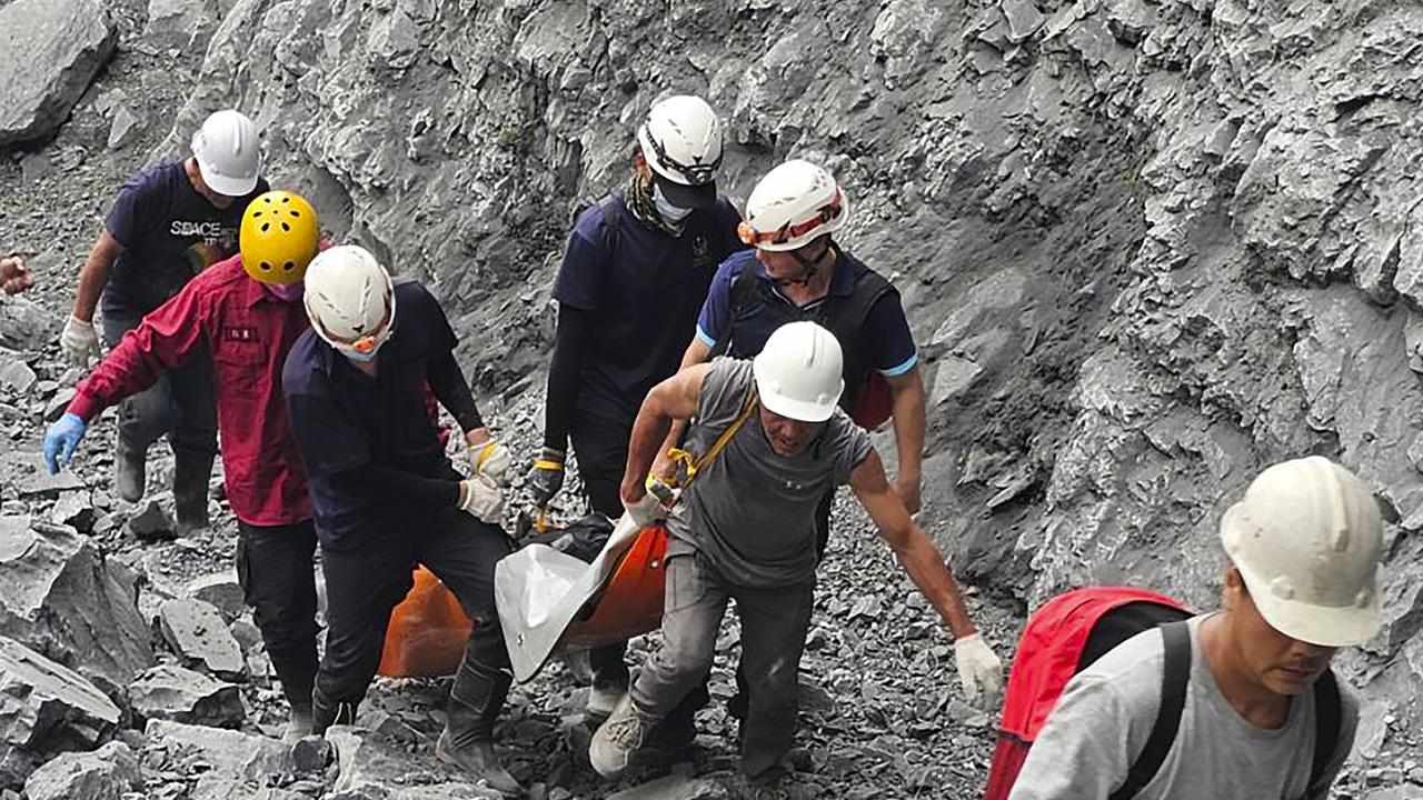 A body is retrieved from a quarry after a earthquake hit Taiwan 