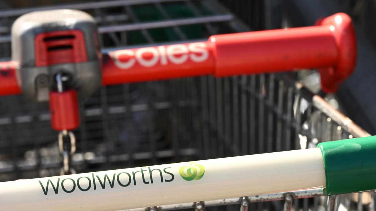Woolworths and Coles supermarket signage (file)