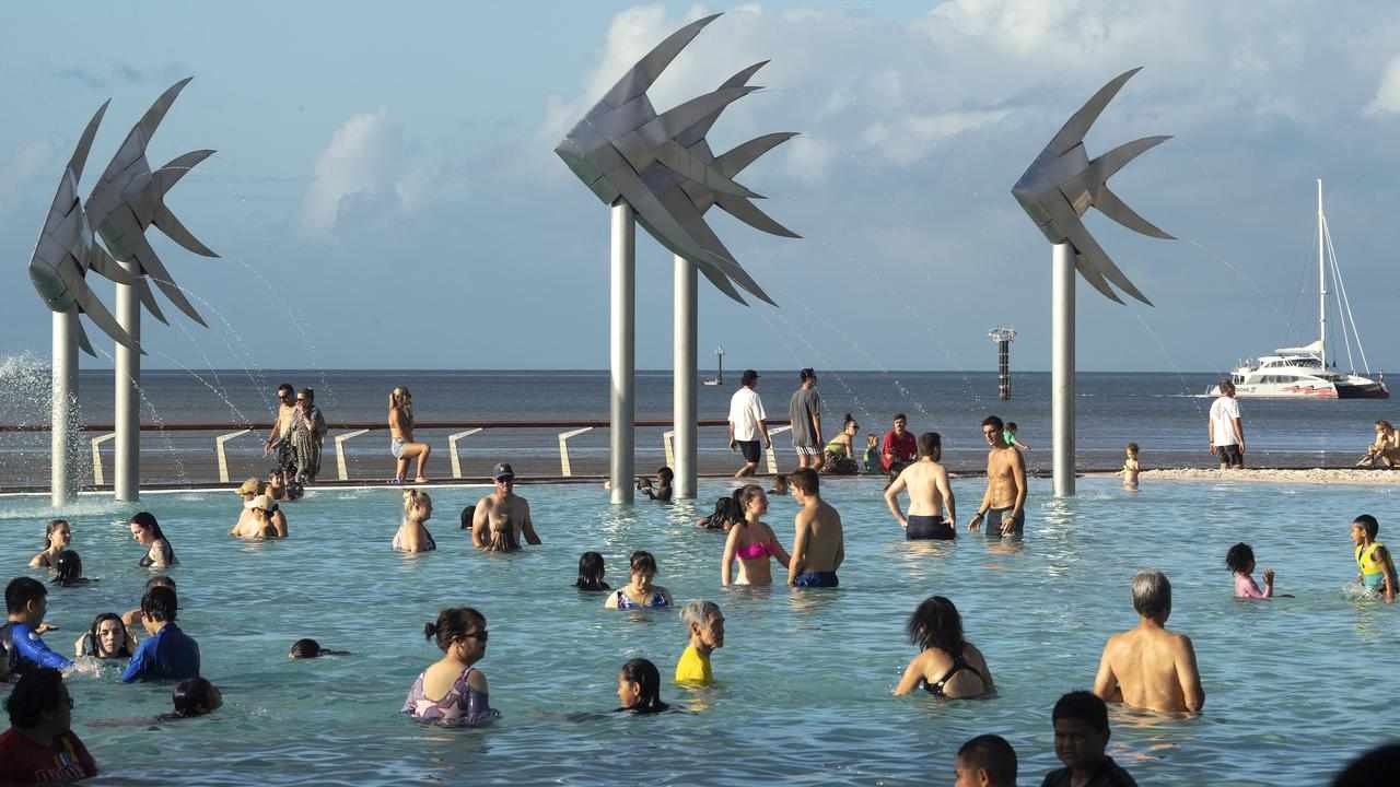 Tourists in the Cairns Esplanade Lagoon.