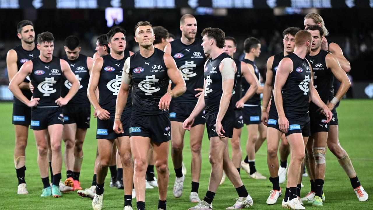 Disappointed Carlton players.