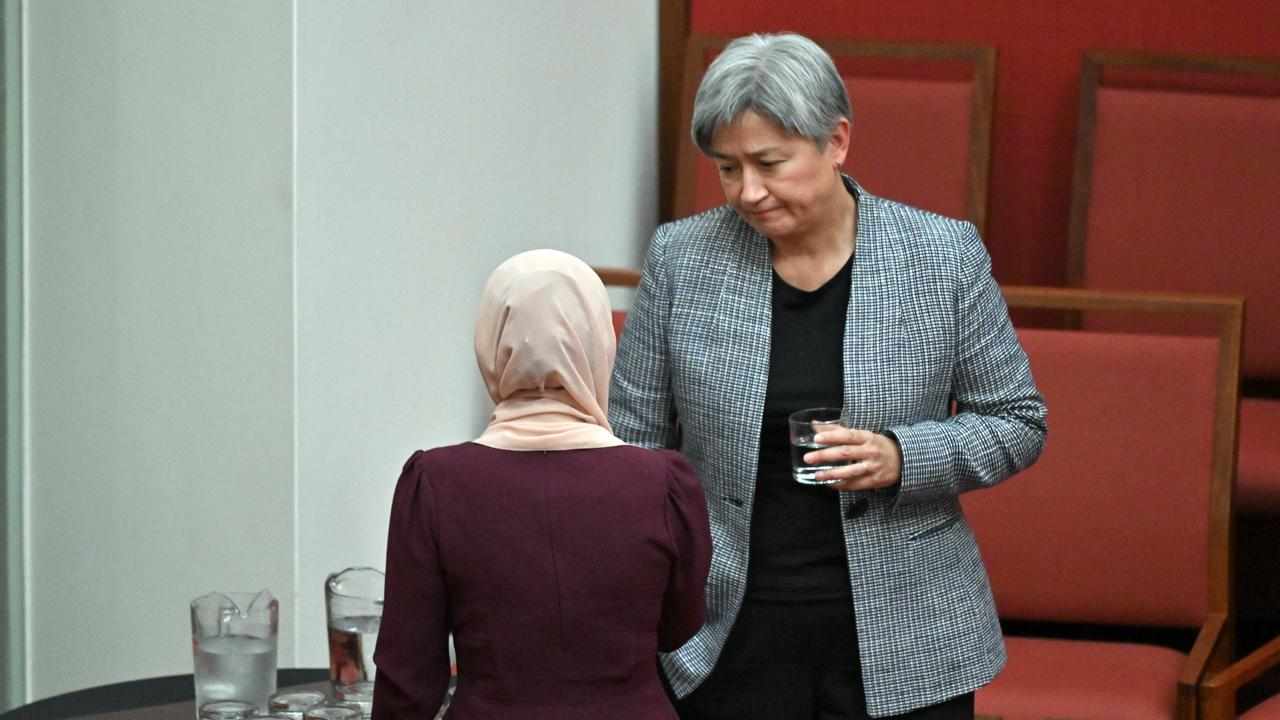 Minister for Foreign Affairs Penny Wong consoles senator Fatima Payman