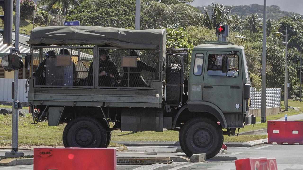 French gendarmes patrol the streets in Noumea