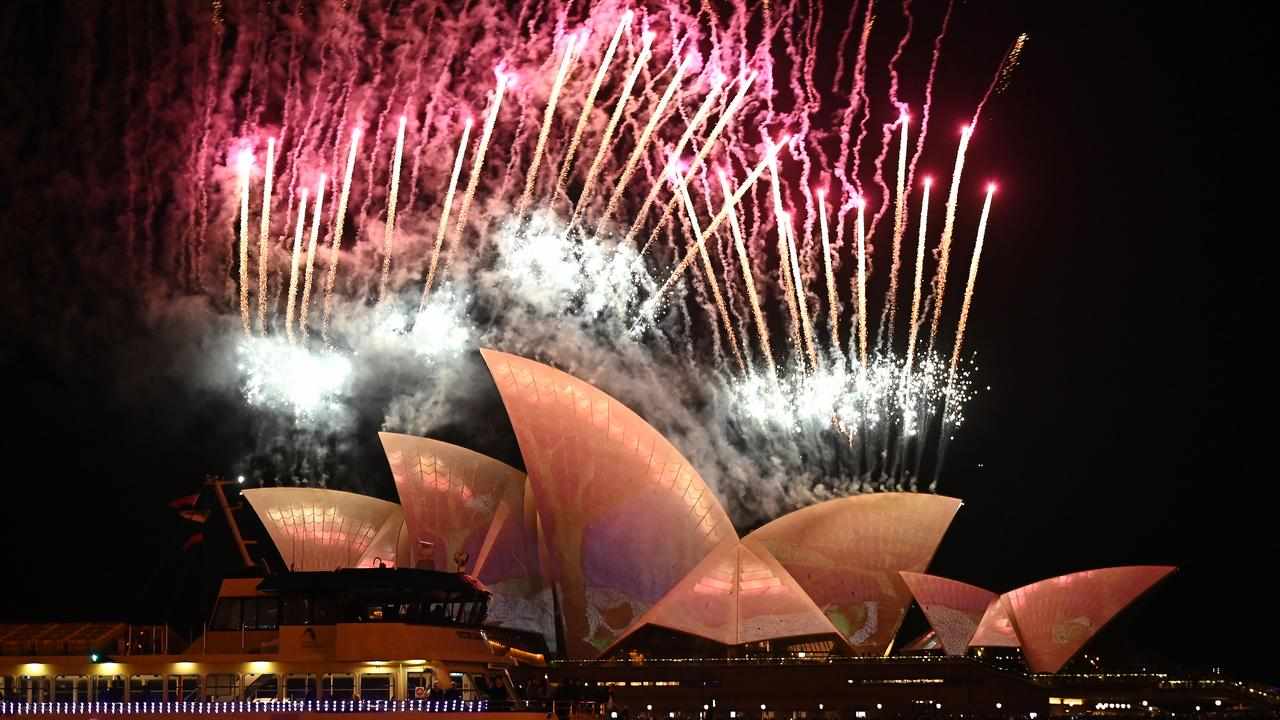 Fireworks are launched behind the Sydney Opera House for Vivid Sydney