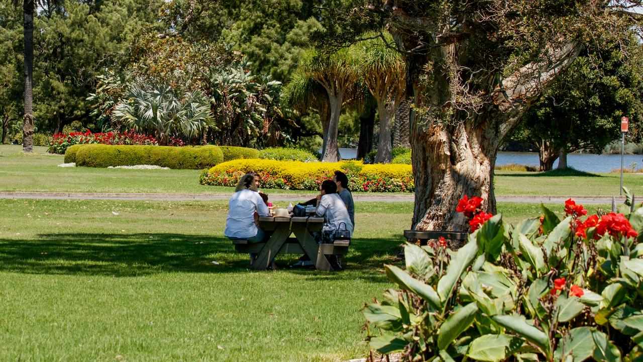 People at a table in a park (file image)