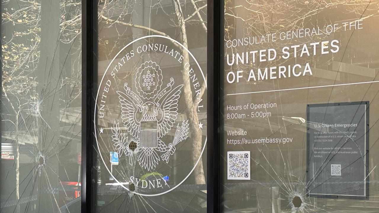 Damaged windows are seen at the US Consulate in Sydney