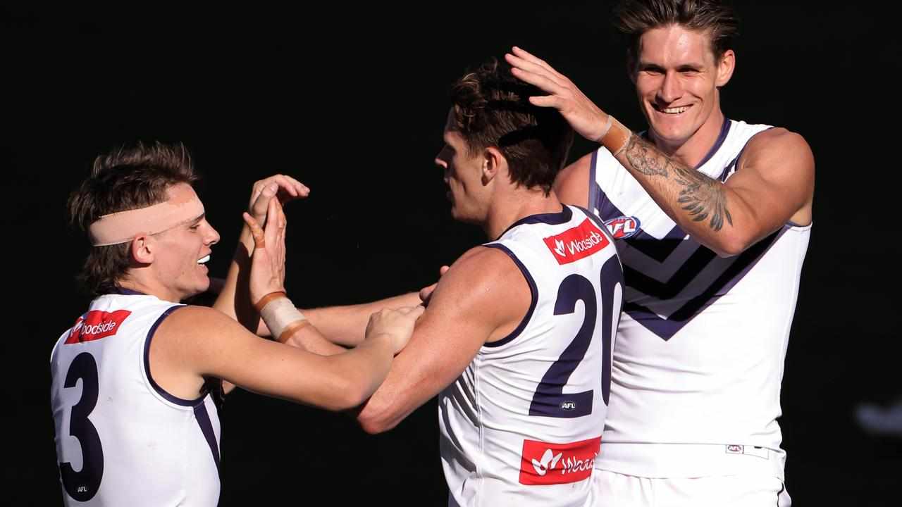 Caleb Serong and Rory Lobb and a teammate when together at Fremantle.