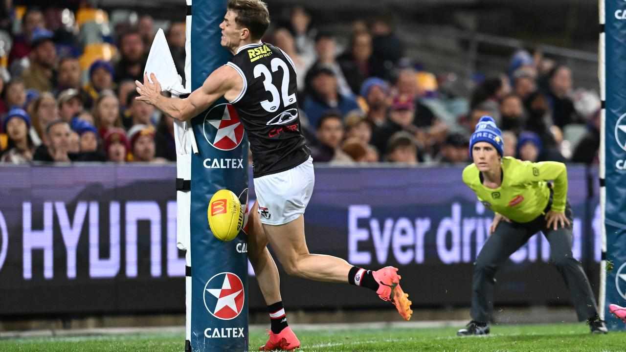 Mason Wood collides with a goalpost.