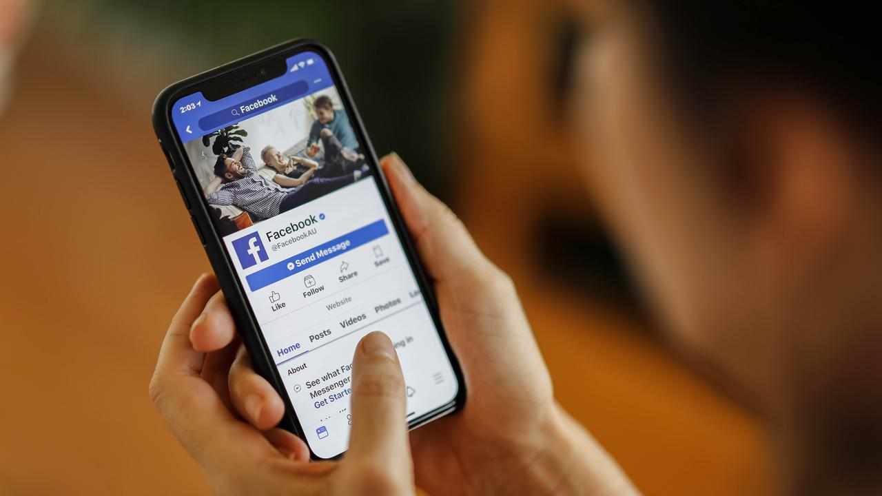 A phone displaying the Facebook app (file image)