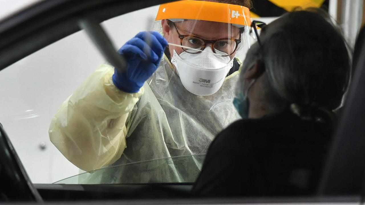 A person in a car is tested at a COVID-19 testing centre in Melbourne