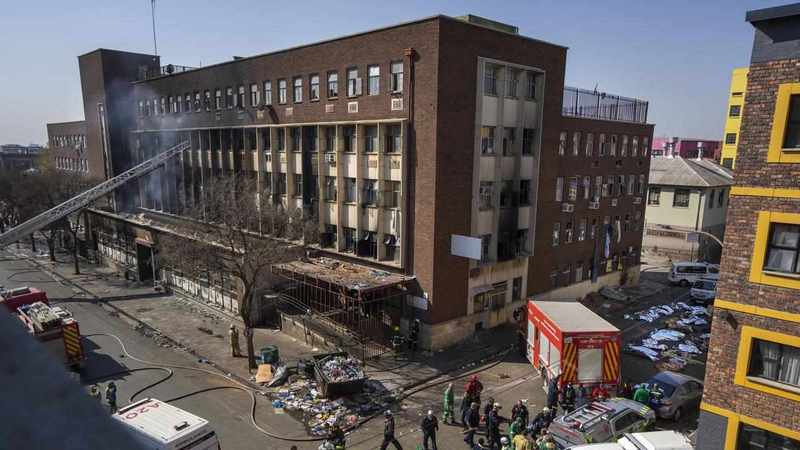 South African apartment block fire kills 74: official