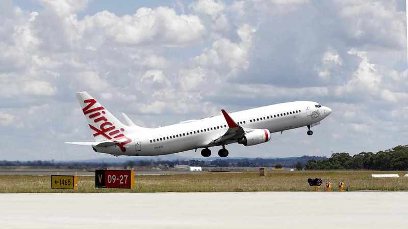 Virgin signs deal with ground staff, cabin threat looms